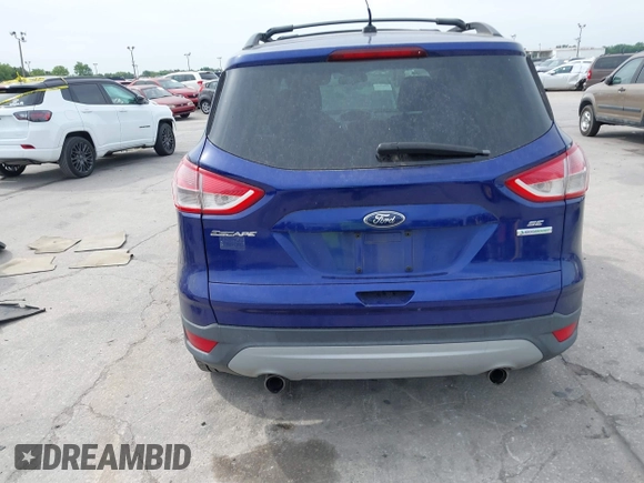 2013 Ford Escape SE with VIN 1FMCU0GXXDUB85818, listed as a IAAI auction lot 41848033 with 128,638 mi miles and . Bid and sale history available at DreamBid. Image 16.