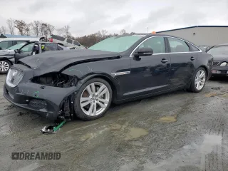 2013 Jaguar XJ Portfolio with VIN SAJWJ2GD8D8V46310, listed as a Copart auction lot 83469474 with 51,850 mi miles and Salvage Title. Bid and sale history available at DreamBid. Image 1.