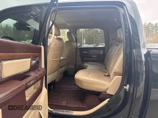 2016 Ram 1500 Laramie z VIN 1C6RR7VM9GS143262, wystawiony jako IAAI lot #42191213 z przebiegiem 159 920 mil mil oraz . Historia ofert i sprzedaży dostępna na DreamBid. Obrazek 8.