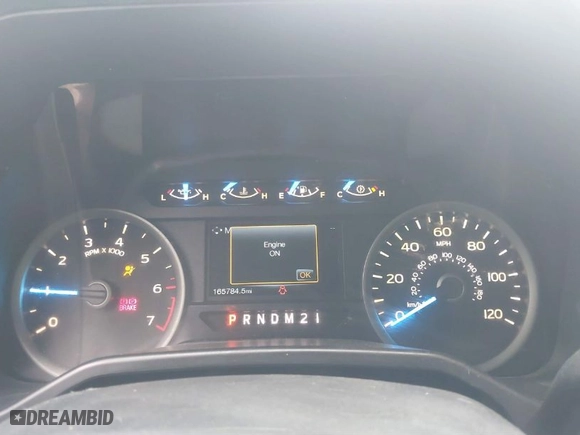 2015 Ford F-150 XLT w/HD Payload Pkg with VIN 1FTFW1EF7FKD04869, listed as a IAAI auction lot 41664736 with 165,784 mi miles. Bid and sale history available at carsss.com. Image 7.