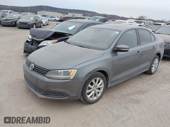 2011 Volkswagen Jetta Sedan SE w/Convenience & Sunroof with VIN 3VWDX7AJ8BM306437, listed as a IAAI auction lot 41714664 with 234,948 mi miles. Bid and sale history available at carsss.com. Image 2.