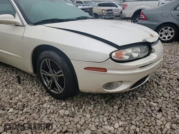2002 Oldsmobile Aurora z VIN 1G3GS64C324168436, wystawiony jako Copart lot #84952644 z przebiegiem 152 785 mil mil oraz Czysty tytuł • Clean title. Historia ofert i sprzedaży dostępna na DreamBid. Obrazek 11.