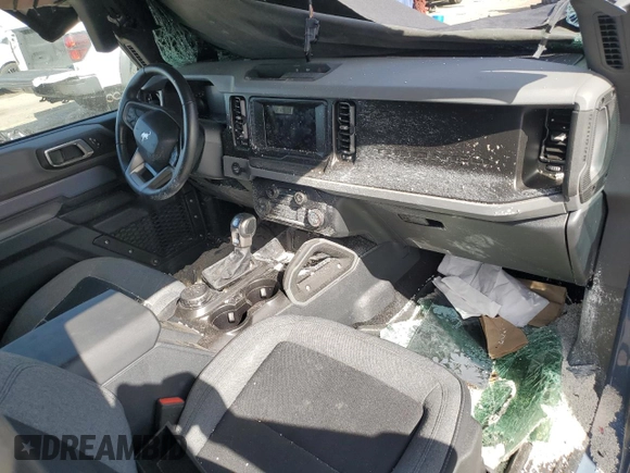 2023 Ford Bronco z VIN 1FMDE5AH6PLB63177, wystawiony jako Copart lot #52208625 z przebiegiem 10 865 mil mil oraz Szkoda całkowita • Salvage title. Historia ofert i sprzedaży dostępna na DreamBid. Obrazek 8.