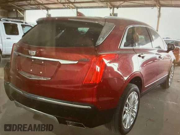 2019 Cadillac XT5 Premium Luxury AWD z VIN 1GYKNFRS2KZ251595, wystawiony jako Copart lot #56428045 z przebiegiem 23 925 mil mil oraz Szkoda całkowita • Salvage title. Historia ofert i sprzedaży dostępna na DreamBid. Obrazek 4.