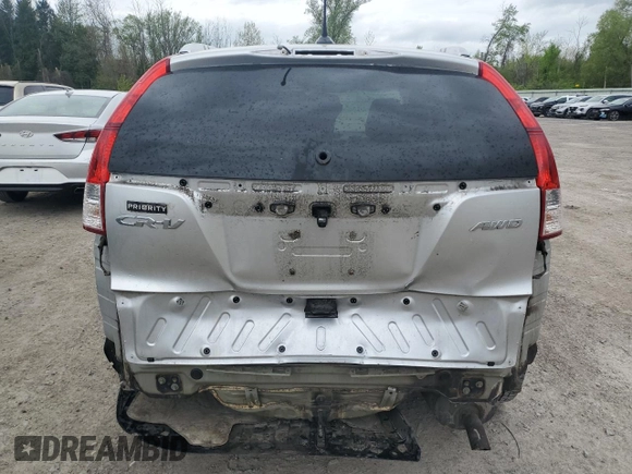 2013 Honda CR-V EX-L z VIN 2HKRM4H72DH623469, wystawiony jako Copart lot #56840385 z przebiegiem 137 287 mil mil oraz Szkody całkowita. Historia ofert i sprzedaży dostępna na DreamBid. Obrazek 6.