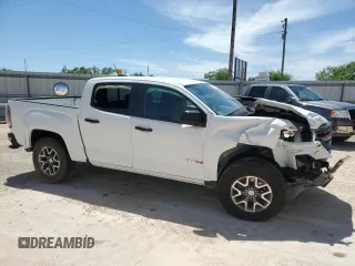 2022 GMC Canyon 4WD AT4 with VIN 1GTG6FEN2N1210072, listed as a Copart auction lot 53247005 with 64,897 mi miles and Salvage Title. Bid and sale history available at carsss.com. Image 4.