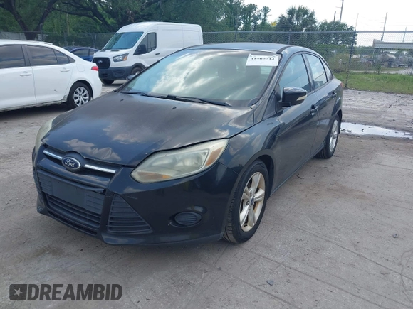 2014 Ford Focus SE with VIN 1FADP3F22EL102502, listed as a IAAI auction lot 41969213 with 154,946 mi miles. Bid and sale history available at carsss.com. Image 2.