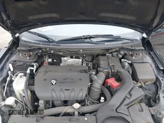 2015 Mitsubishi Lancer ES z VIN JA32U2FU9FU002350, wystawiony jako IAAI lot #40054160 z przebiegiem 120 980 mil mil oraz . Historia ofert i sprzedaży dostępna na DreamBid. Obrazek 10.