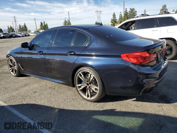 2020 BMW 5 Series M550i xDrive with VIN WBAJS7C06LBN96210, listed as a Copart auction lot 46769365 with 39,710 mi miles and Salvage title. Bid and sale history available at DreamBid. Image 2.