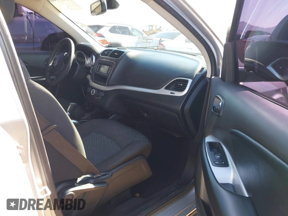 2019 Dodge Journey SE with VIN 3C4PDCBG0KT701223, listed as a IAAI auction lot 41286446 with 71,572 mi miles and . Bid and sale history available at DreamBid. Image 5.