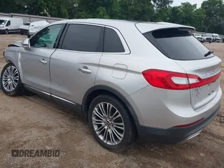 2018 Lincoln MKX Reserve z VIN 2LMPJ6LR1JBL30318, wystawiony jako IAAI lot #42204680 z przebiegiem 94 903 mil mil oraz . Historia ofert i sprzedaży dostępna na DreamBid. Obrazek 3.