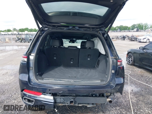 2023 Jeep Grand Cherokee Overland with VIN 1C4RJHDG8P8822650, listed as a IAAI auction lot 42145252 with 63,100 mi miles and . Bid and sale history available at DreamBid. Image 18.
