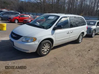 2003 Chrysler Town & Country LX with VIN 2C4GP44L33R117314, listed as a IAAI auction lot 41674437 with Not Provided miles and . Bid and sale history available at DreamBid. Image 2.