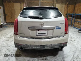 2013 Cadillac SRX Premium Collection с VIN 3GYFNJE35DS549948, выставлен на аукционе Copart как лот 45654295 с пробегом 79 793 миль миль и Чистый • Clean title. История ставок и продаж доступна на DreamBid. Изображение 6.
