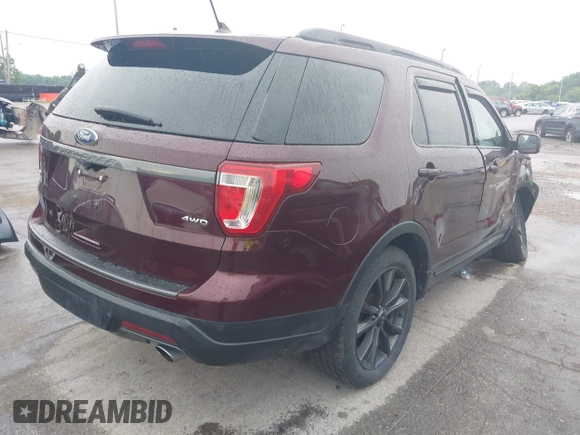 2018 Ford Explorer XLT z VIN 1FM5K8D87JGC67946, wystawiony jako IAAI lot #42615709 z przebiegiem 39 872 mil mil oraz . Historia ofert i sprzedaży dostępna na DreamBid. Obrazek 4.
