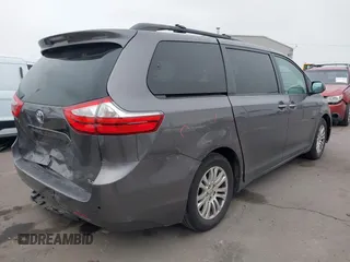 2015 Toyota Sienna XLE with VIN 5TDYK3DC6FS672329, listed as a IAAI auction lot 41908974 with 117,950 mi miles. Bid and sale history available at carsss.com. Image 4.