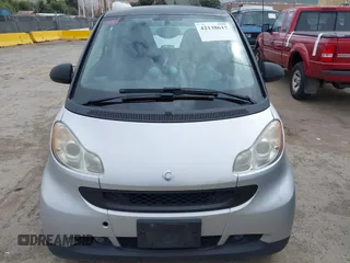 2008 Smart fortwo Pure z VIN WMEEJ31X18K191722, wystawiony jako IAAI lot #42138617 z przebiegiem 117 263 mil mil oraz . Historia ofert i sprzedaży dostępna na DreamBid. Obrazek 6.