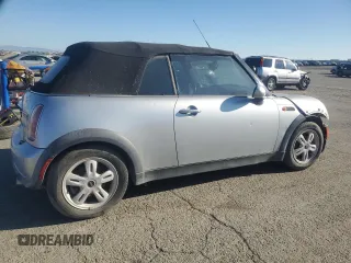 2005 MINI Convertible with VIN WMWRF33465TG10044, listed as a Copart auction lot 50364235 with 152,186 mi miles and Salvage title. Bid and sale history available at DreamBid. Image 3.