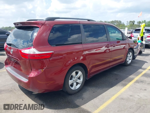 2015 Toyota Sienna LE AAS with VIN 5TDKK3DC7FS685452, listed as a IAAI auction lot 41942789 with 194,163 mi miles. Bid and sale history available at carsss.com. Image 4.