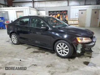 2012 Volkswagen Jetta SE with VIN 3VWDP7AJ1CM462465, listed as a Copart auction lot 59549635 with 238,393 mi miles and Salvage title. Bid and sale history available at DreamBid. Image 4.