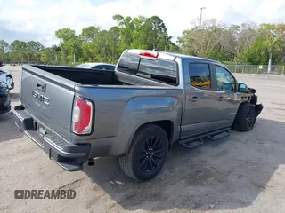 2021 GMC Canyon 2WD Elevation with VIN 1GTG5CEN6M1293098, listed as a IAAI auction lot 41477792 with 48,252 mi miles. Bid and sale history available at carsss.com. Image 4.