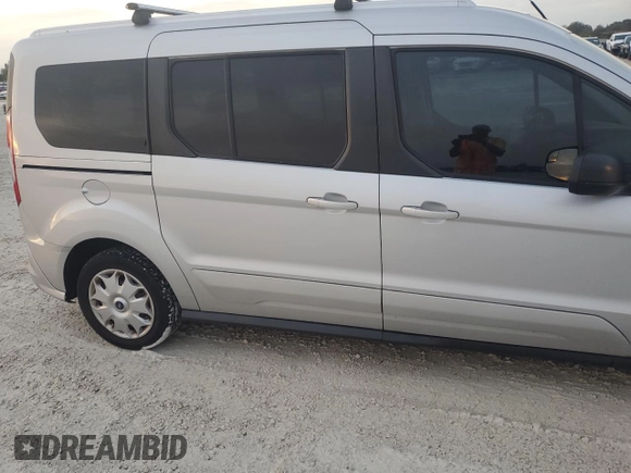 2017 Ford Transit Connect XLT z VIN NM0GS9F70H1315191, wystawiony jako Copart lot #78348184 z przebiegiem Nie podano mil oraz Szkoda całkowita • Salvage title. Historia ofert i sprzedaży dostępna na DreamBid. Obrazek 12.