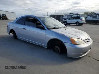 2002 Honda Civic DX with VIN 1HGEM22212L020068, listed as a Copart auction lot 50657135 with Not Provided miles and Salvage Title. Bid and sale history available at DreamBid. Image 4.