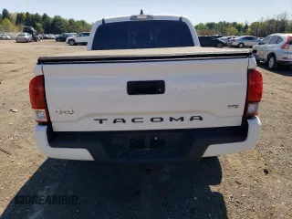 2021 Toyota Tacoma SR z VIN 3TYCZ5ANXMT032035, wystawiony jako Copart lot #54517835 z przebiegiem 81 582 mil mil oraz Szkoda całkowita • Salvage title. Historia ofert i sprzedaży dostępna na DreamBid. Obrazek 6.