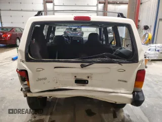 2000 Jeep Cherokee z VIN 1J4FF48S2YL104094, wystawiony jako Copart lot #57347705 z przebiegiem 75 948 mil mil oraz Nie do naprawy • Non repairable. Historia ofert i sprzedaży dostępna na DreamBid. Obrazek 6.