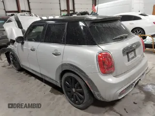 2015 MINI Hardtop 4 Door S with VIN WMWXU3C56F2B66449, listed as a IAAI auction lot 41296784 with 53,589 mi miles and . Bid and sale history available at DreamBid. Image 3.