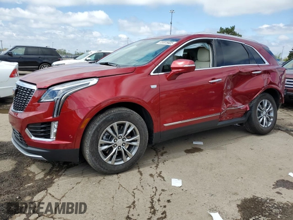2023 Cadillac XT5 FWD Premium Luxury z VIN 1GYKNCRS5PZ173528, wystawiony jako Copart lot #55805605 z przebiegiem 7 789 mil mil oraz Szkoda całkowita • Salvage title. Historia ofert i sprzedaży dostępna na DreamBid. Obrazek 1.