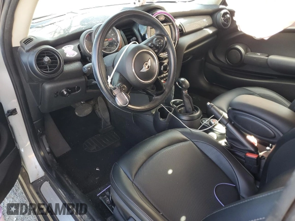 2017 MINI Hardtop Cooper with VIN WMWXP5C34H2F61072, listed as a Copart auction lot 57314695 with 46,693 mi miles and Salvage title. Bid and sale history available at DreamBid. Image 8.