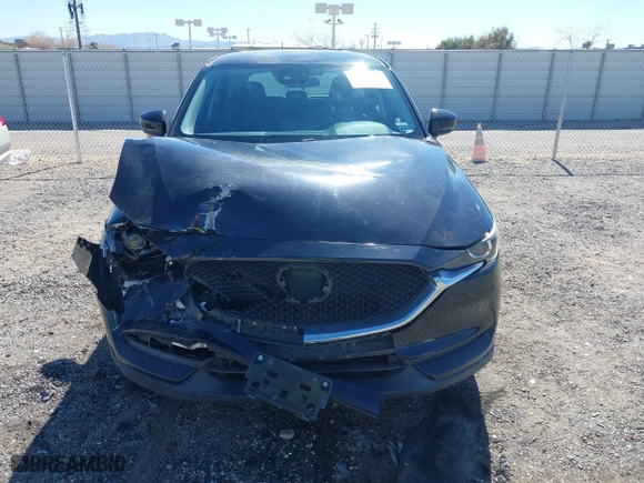 2017 Mazda CX-5 Sport with VIN JM3KFBBL2H0144792, listed as a IAAI auction lot 41654031 with 77,107 mi miles. Bid and sale history available at carsss.com. Image 12.