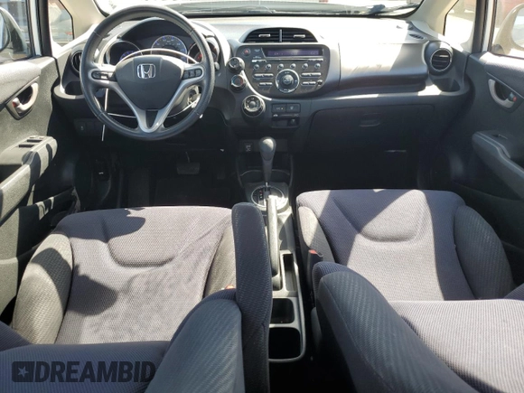 2012 Honda Fit Sport with VIN JHMGE8H50CC009958, listed as a Copart auction lot 55423075 with 117,618 mi miles and Salvage Title. Bid and sale history available at DreamBid. Image 8.