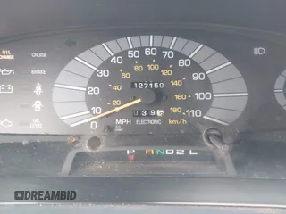 1991 Toyota Previa LE z VIN JT3AC12RXM1003215, wystawiony jako IAAI lot #42068000 z przebiegiem 127 150 mil mil oraz . Historia ofert i sprzedaży dostępna na DreamBid. Obrazek 7.