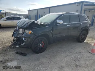 2017 Jeep Grand Cherokee Overland with VIN 1C4RJECG1HC723652, listed as a Copart auction lot 84243394 with 110,082 mi miles and Salvage Title. Bid and sale history available at carsss.com. Image 1.