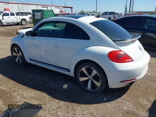 2012 Volkswagen Beetle with VIN 3VWV87AT1CM627756, listed as a IAAI auction lot 41657307 with 81,924 mi miles and . Bid and sale history available at DreamBid. Image 3.