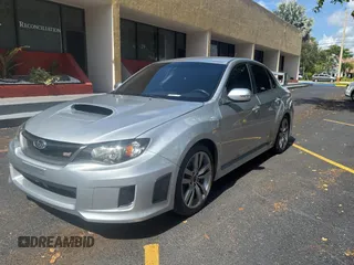 2012 Subaru WRX WRX STI with VIN JF1GV8J65CL002496, listed as a Copart auction lot 64390005 with 182,855 mi miles and Clean title. Bid and sale history available at DreamBid. Image 2.