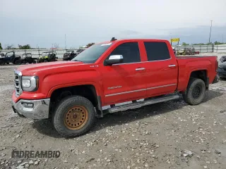 2018 GMC Sierra 1500 SLT z VIN 3GTU2NEC0JG374956, wystawiony jako Copart lot #53969945 z przebiegiem 127 842 mil mil oraz Szkoda całkowita • Salvage title. Historia ofert i sprzedaży dostępna na DreamBid. Obrazek 1.