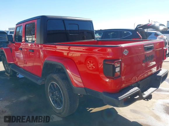 2021 Jeep Gladiator Freedom z VIN 1C6HJTAG7ML609661, wystawiony jako IAAI lot #41410756 z przebiegiem 44 636 mil mil oraz . Historia ofert i sprzedaży dostępna na DreamBid. Obrazek 3.