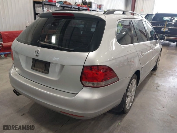 2012 Volkswagen Jetta SportWagen TDI with VIN 3VWML7AJ4CM668312, listed as a IAAI auction lot 41998809 with 130,866 mi miles. Bid and sale history available at carsss.com. Image 4.
