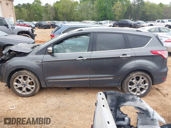 2015 Ford Escape Titanium with VIN 1FMCU9J90FUC14650, listed as a IAAI auction lot 41992858 with 158,963 mi miles and . Bid and sale history available at DreamBid. Image 14.