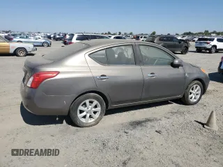 2012 Nissan Versa SV with VIN 3N1CN7AP1CL812288, listed as a Copart auction lot 63996355 with 128,229 mi miles and Clean title. Bid and sale history available at DreamBid. Image 3.