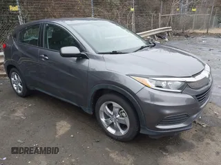 2021 Honda HR-V LX z VIN 3CZRU5H35MM703789, wystawiony jako IAAI lot #41392922 z przebiegiem 70 416 mil mil oraz . Historia ofert i sprzedaży dostępna na DreamBid. Obrazek 1.