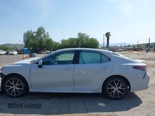 2023 Toyota Camry SE with VIN 4T1T11AK8PU138805, listed as a IAAI auction lot 41977827 with 19,661 mi miles and . Bid and sale history available at DreamBid. Image 15.
