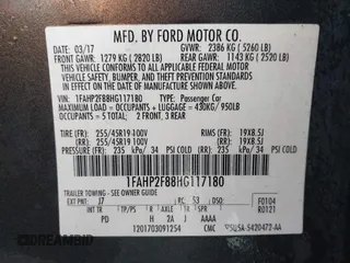 2017 Ford Taurus Limited with VIN 1FAHP2F88HG117180, listed as a IAAI auction lot 41760619 with 164,175 mi miles and . Bid and sale history available at DreamBid. Image 9.