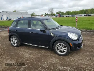 2015 MINI Countryman S with VIN WMWZC5C56FWP47995, listed as a Copart auction lot 55924945 with 46,825 mi miles and Salvage Title. Bid and sale history available at DreamBid. Image 4.