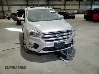 2019 Ford Escape Titanium with VIN 1FMCU0J96KUB77741, listed as a Copart auction lot 57517325 with 90,002 mi miles and Non repairable. Bid and sale history available at DreamBid. Image 14.