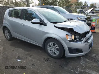 2016 Chevrolet Sonic LT with VIN 1G1JC6SG5G4103970, listed as a Copart auction lot 87513065 with 121,181 mi miles and Salvage Title. Bid and sale history available at carsss.com. Image 4.