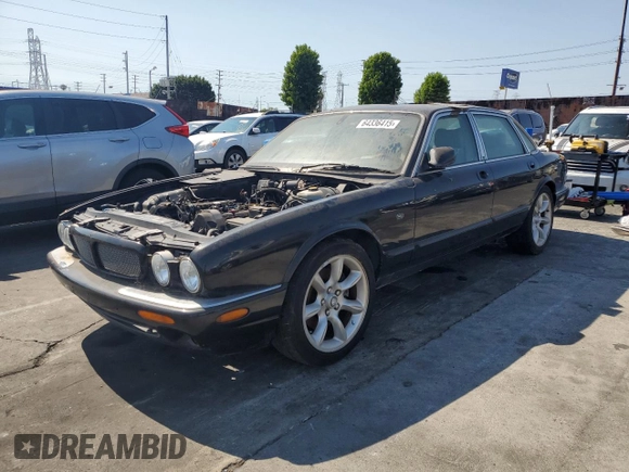 2003 Jaguar XJ with VIN SAJDA15B63MF52618, listed as a Copart auction lot 64336415 with Not provided miles and Clean title. Bid and sale history available at DreamBid. Image 1.